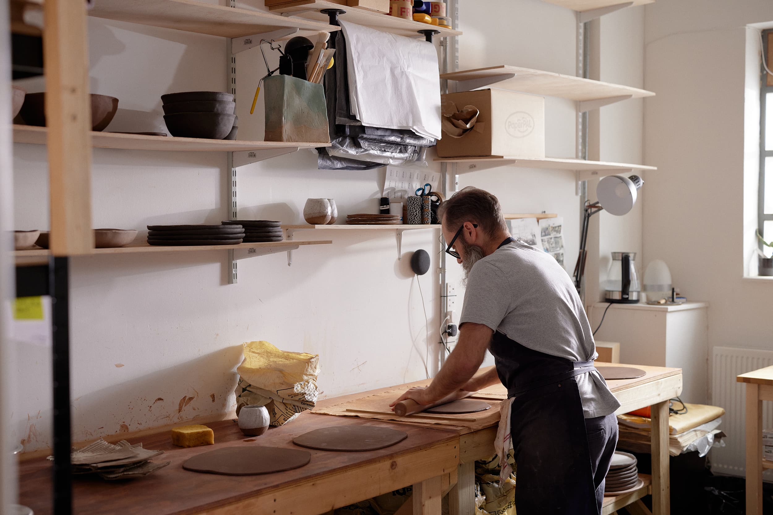 Fabio Bernardi, founder of Tidy, working in his pottery studio at Apple&Pear Studio in Somerset, UK